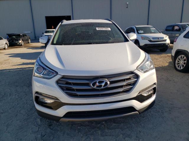 Photo 5 from auction – 2017 HYUNDAI SANTA FE S with VIN 5NMZU3LB0HH014907