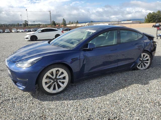 TESLA MODEL 3 2022 with VIN 5YJ3E1EB6NF143610 - Photo from auction