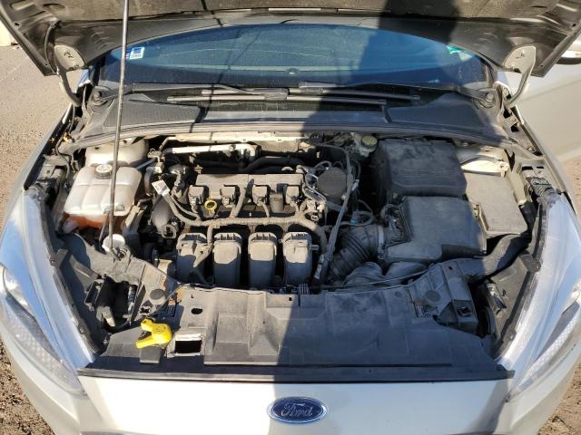 Photo 11 from auction – 2015 FORD FOCUS SE with VIN 1FADP3F22FL334244