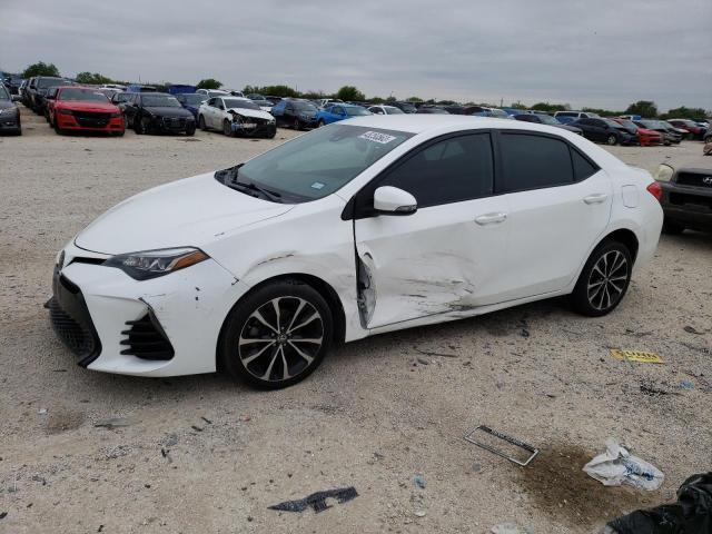 TOYOTA COROLLA L 2017 with VIN 5YFBURHE4HP592201 - Photo from auction