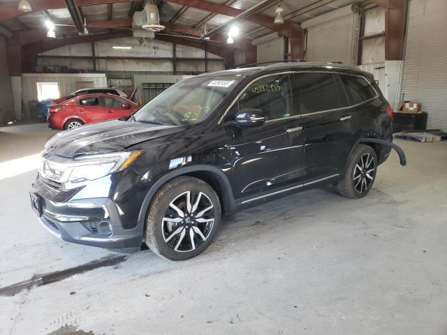 HONDA PILOT ELIT 2020 with VIN 5FNYF6H03LB043827 - Photo from auction