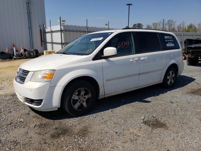 DODGE GRAND CARA 2010 with VIN 2D4RN5D18AR488925 - Photo from auction