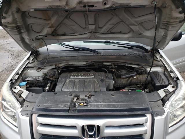 Photo 11 from auction – 2006 HONDA PILOT LX with VIN 2HKYF18116H506825