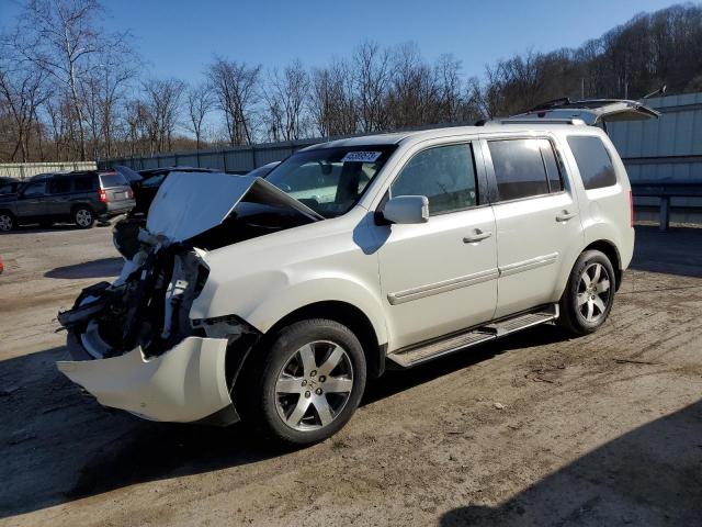 HONDA PILOT TOUR 2012 with VIN 5FNYF4H9XCB086158 - Photo from auction