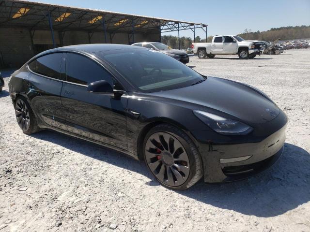 Photo 4 from auction – 2021 TESLA MODEL 3 with VIN 5YJ3E1EC7MF036993