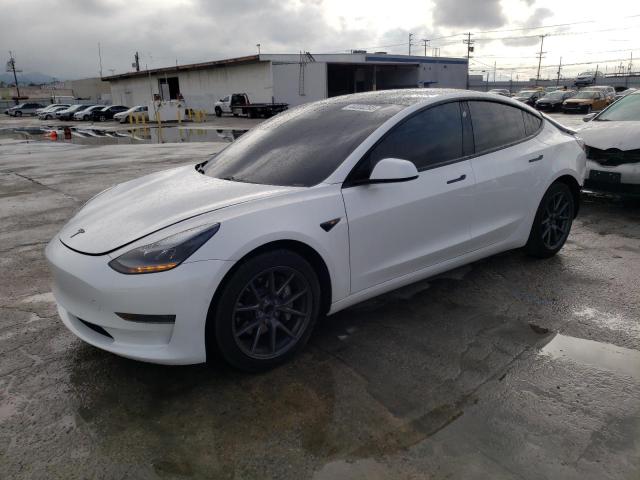 TESLA MODEL 3 2021 with VIN 5YJ3E1EAXMF986411 - Photo from auction