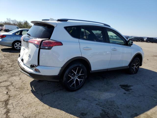 Photo 3 from auction – 2017 TOYOTA RAV4 SE with VIN JTMJFREV0HD217547