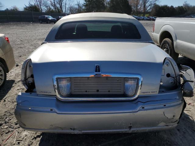 Photo 6 from auction – 2003 LINCOLN TOWN CAR E with VIN 1LNHM81W03Y672988