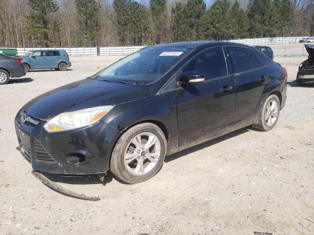 FORD FOCUS SE 2014 with VIN 1FADP3F21EL233159 - Photo from auction