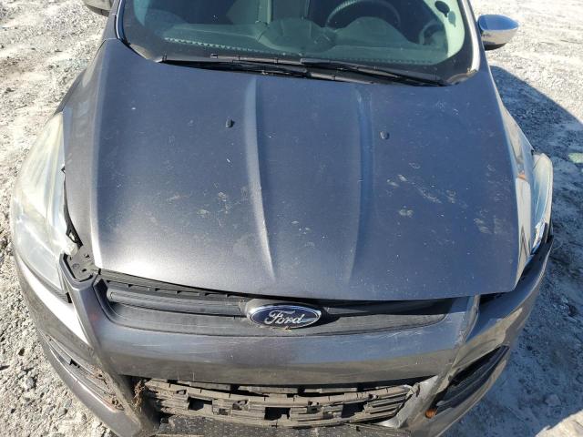 Photo 11 from auction – 2014 FORD ESCAPE S with VIN 1FMCU0F76EUD77062