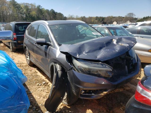 Photo 4 from auction – 2015 HONDA CR-V EXL with VIN 2HKRM4H79FH645679