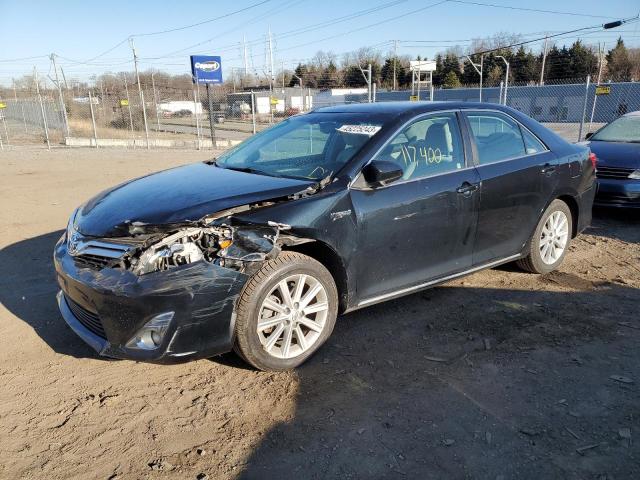 TOYOTA CAMRY HYBR 2012 with VIN 4T1BD1FK4CU034334 - Photo from auction