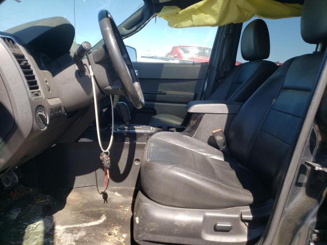 Photo 7 from auction – 2009 FORD ESCAPE LIM with VIN 1FMCU94GX9KB54676