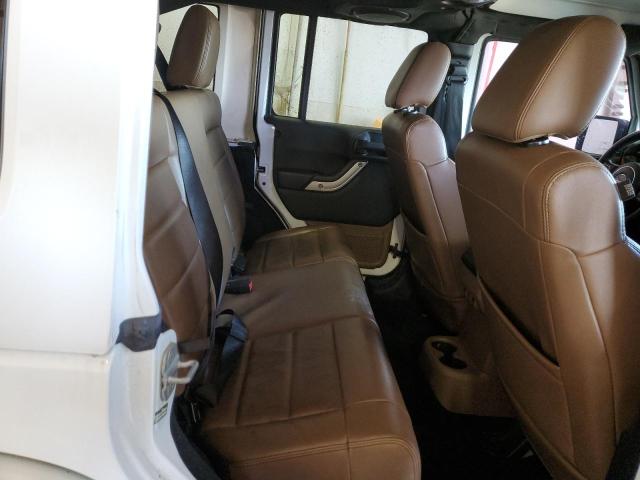 Photo 11 from auction – 2011 JEEP WRANGLER U with VIN 1J4HA5H16BL536733