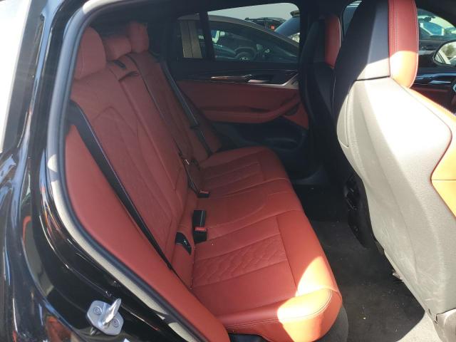 Photo 11 from auction – 2023 BMW X4 M with VIN 5YM23EC01P9P42333
