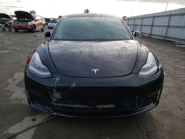 Photo 5 from auction – 2019 TESLA MODEL 3 with VIN 5YJ3E1EB2KF384849