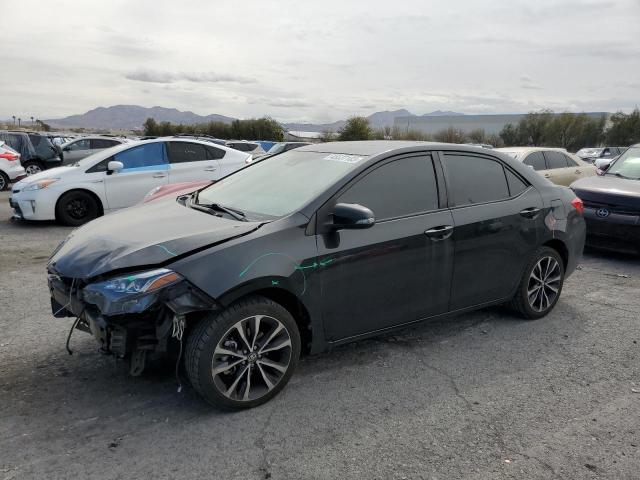TOYOTA COROLLA L 2018 with VIN 5YFBURHE9JP793811 - Photo from auction