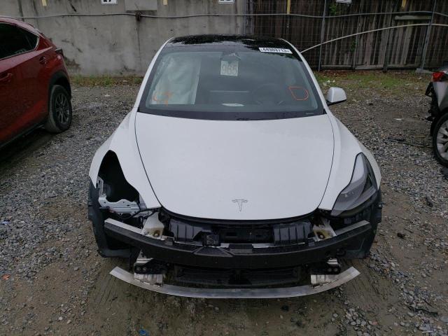 Photo 5 from auction – 2021 TESLA MODEL 3 with VIN 5YJ3E1EA0MF907893