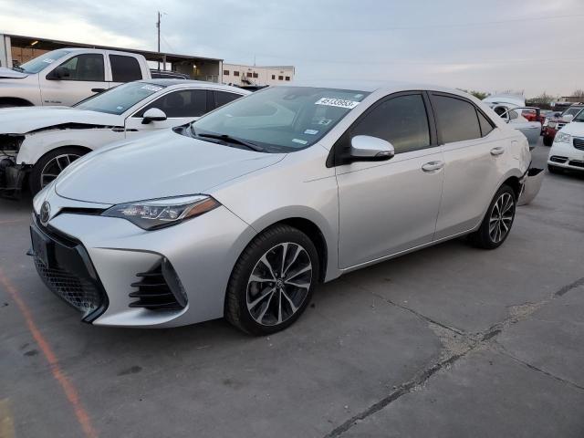 TOYOTA COROLLA L 2018 with VIN 5YFBURHE5JP814556 - Photo from auction