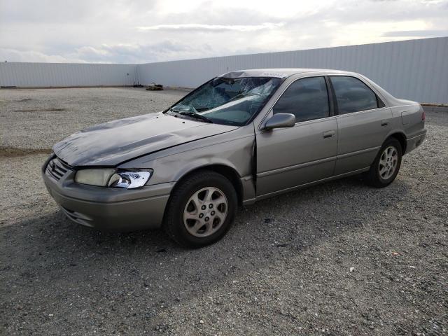 TOYOTA CAMRY LE 1999 with VIN JT2BF22K4X0188137 - Photo from auction