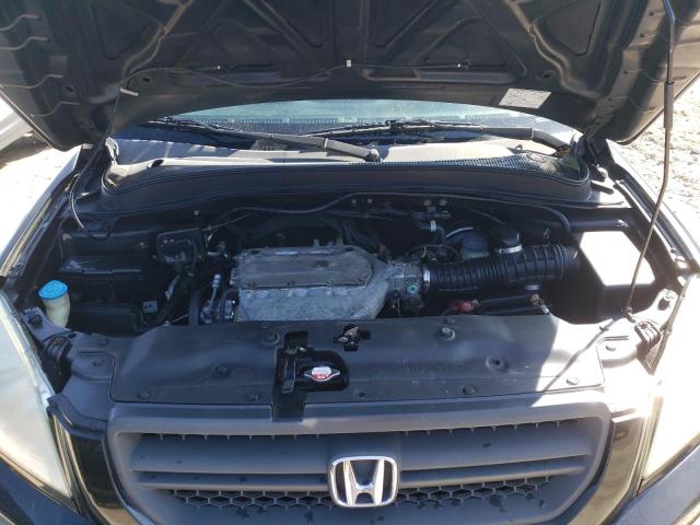 Photo 12 from auction – 2005 HONDA PILOT LX with VIN 2HKYF18115H537961