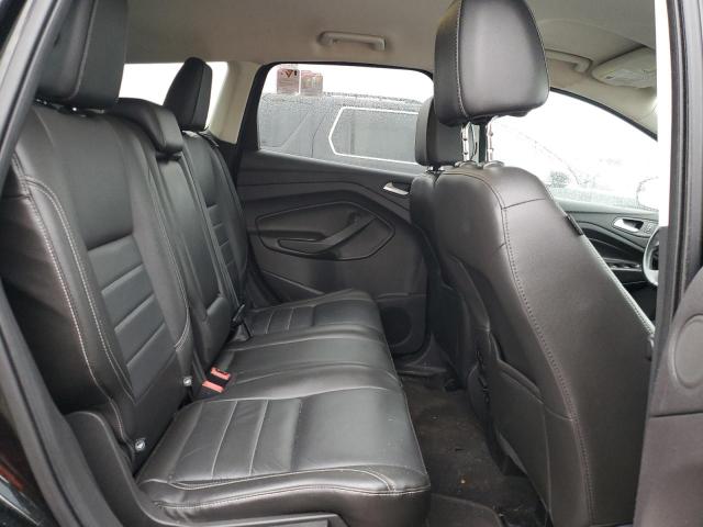 Photo 11 from auction – 2016 FORD ESCAPE SE with VIN 1FMCU9GX9GUA55084