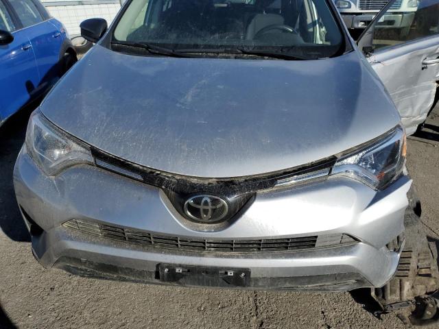 Photo 11 from auction – 2018 TOYOTA RAV4 LE with VIN JTMBFREV4JJ241586