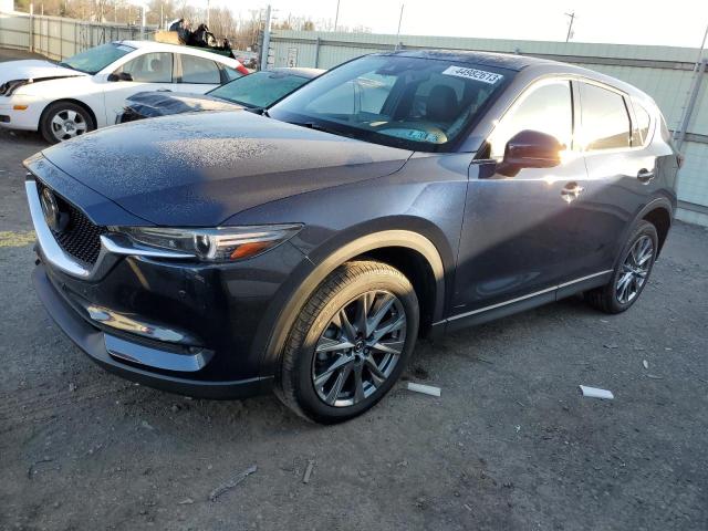 Photo 1 from auction – 2021 MAZDA CX-5 SIGNA with VIN JM3KFBEY9M0322781