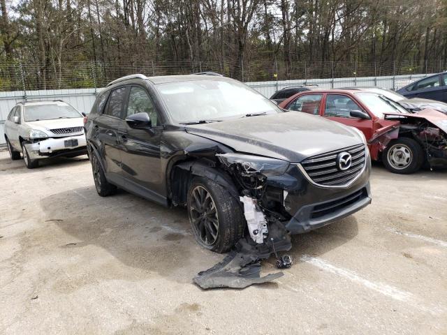 Photo 4 from auction – 2016 MAZDA CX-5 GT with VIN JM3KE2DY4G0655740