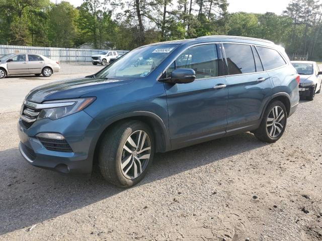 HONDA PILOT TOUR 2017 with VIN 5FNYF5H96HB007145 - Photo from auction