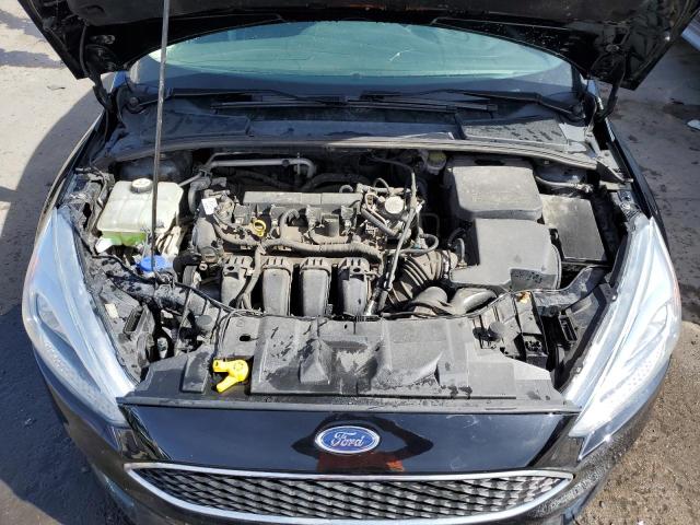 Photo 11 from auction – 2016 FORD FOCUS SE with VIN 1FADP3F25GL361536