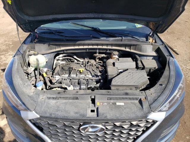Photo 12 from auction – 2019 HYUNDAI TUCSON SE with VIN KM8J2CA48KU921892