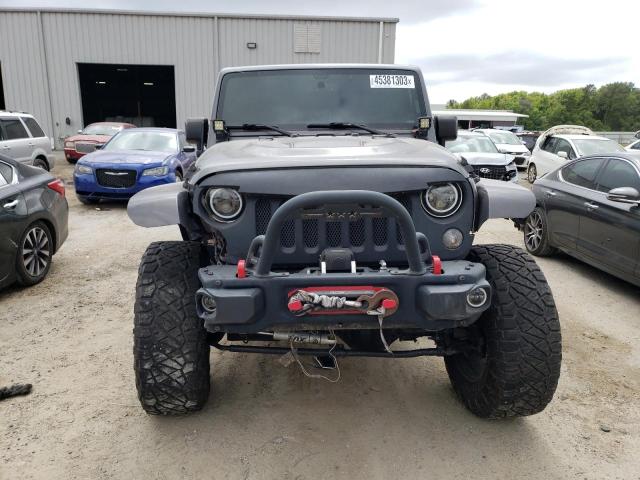 Photo 5 from auction – 2016 JEEP WRANGLER U with VIN 1C4BJWFG8GL171813