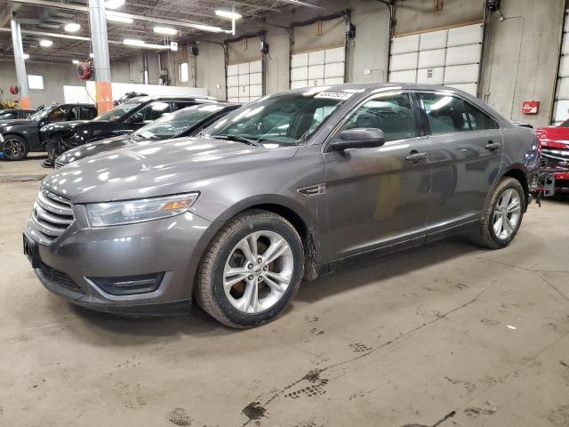 FORD TAURUS SEL 2014 with VIN 1FAHP2E80EG141129 - Photo from auction