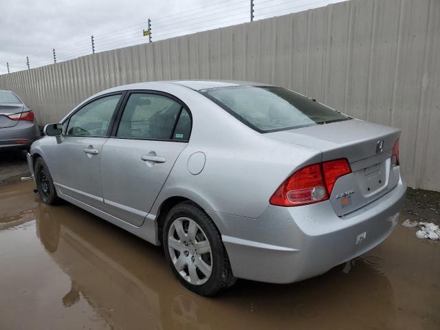 Photo 2 from auction – 2006 HONDA CIVIC LX with VIN JHMFA16506S010877