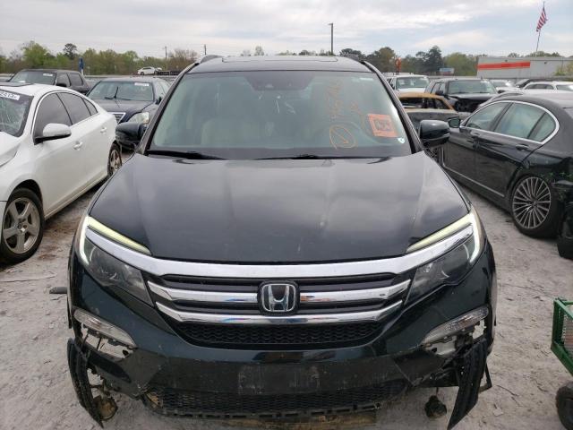 Photo 5 from auction – 2016 HONDA PILOT ELIT with VIN 5FNYF6H03GB090345