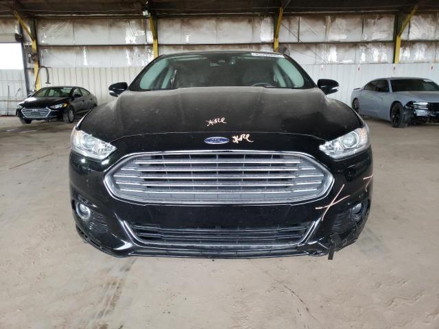 Photo 5 from auction – 2016 FORD FUSION TIT with VIN 3FA6P0SUXGR282895