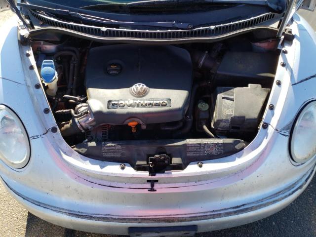 Photo 11 from auction – 2004 VOLKSWAGEN NEW BEETLE with VIN 3VWCD31C54M409106