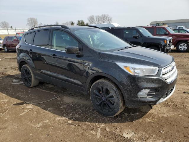 Photo 4 from auction – 2018 FORD ESCAPE SE with VIN 1FMCU9GD5JUA90413