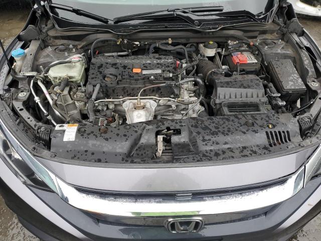 Photo 11 from auction – 2017 HONDA CIVIC LX with VIN 2HGFC2F59HH558969