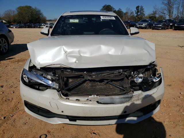 Photo 5 from auction – 2016 BMW 320 I with VIN WBA8E1G55GNT99560