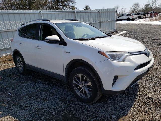 Photo 4 from auction – 2018 TOYOTA RAV4 HV LE with VIN JTMRJREV2JD182145