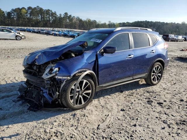NISSAN ROGUE S 2019 with VIN 5N1AT2MT2KC767518 - Photo from auction
