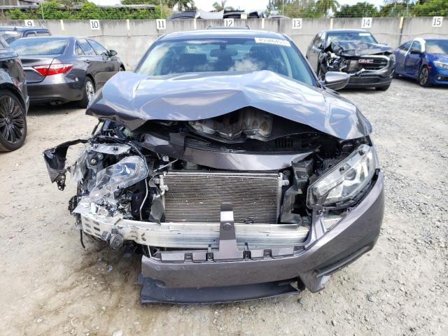 Photo 5 from auction – 2018 HONDA CIVIC EX with VIN 19XFC2F71JE025726