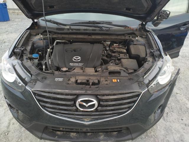 Photo 12 from auction – 2016 MAZDA CX-5 GT with VIN JM3KE2DY9G0780863