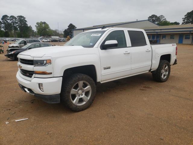 CHEVROLET SILVERADO 2018 with VIN 3GCUKRECXJG616921 - Photo from auction