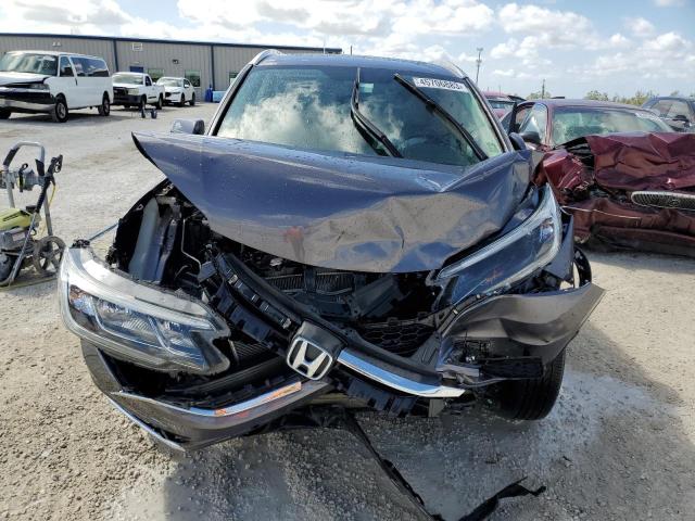 Photo 5 from auction – 2016 HONDA CR-V EXL with VIN 5J6RM4H70GL095229