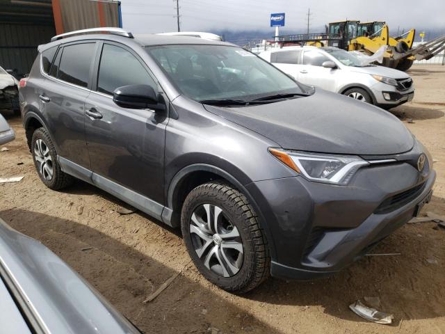 Photo 4 from auction – 2018 TOYOTA RAV4 LE with VIN 2T3BFREV1JW742145