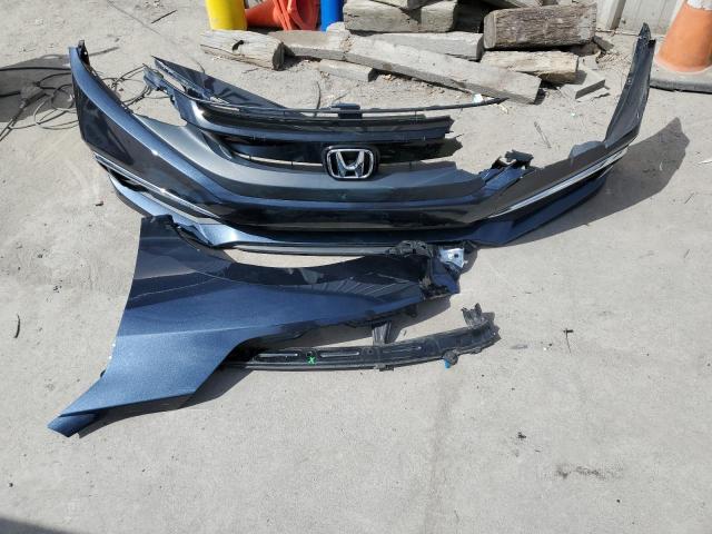 Photo 12 from auction – 2019 HONDA CIVIC LX with VIN 2HGFC2F64KH534532