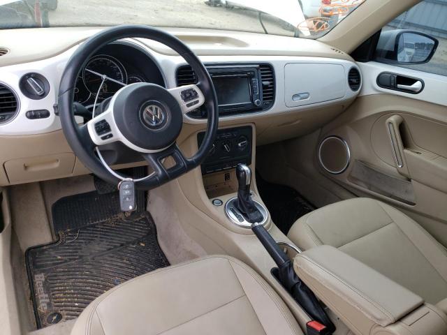 Photo 8 from auction – 2013 VOLKSWAGEN BEETLE with VIN 3VWJP7AT7DM676155
